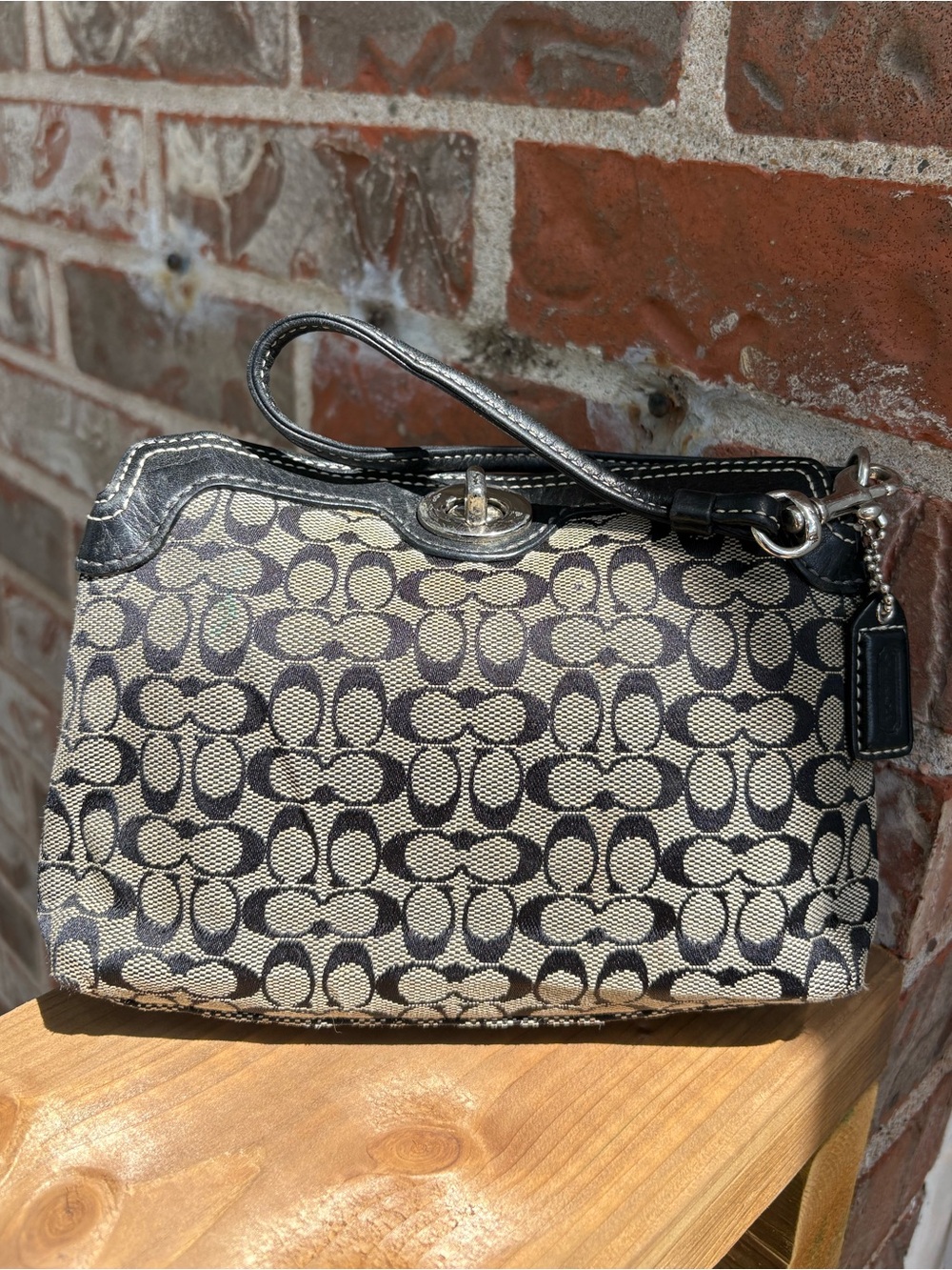 Coach Legacy top mini turnlock wristlet